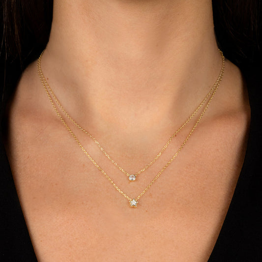 Collana doppia con stella e punto luce
