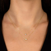 Collana doppia con stella e punto luce