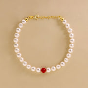 Bracciale Di Perle Bianco Con Perla Colorata
